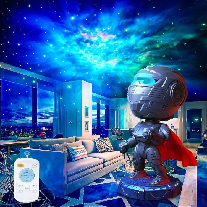 Warrior star projector in a living room, nebula and stars on the ceiling, remote beside it